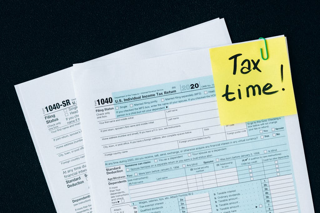 U.S. tax documents with a 'Tax time!' reminder, highlighting the importance of filing deadlines.